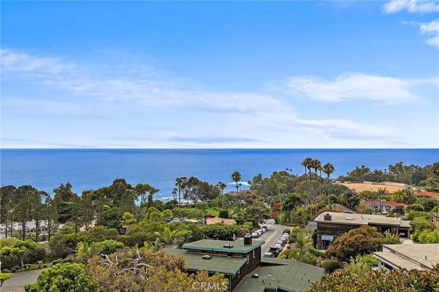 a balcony with furniture and a table