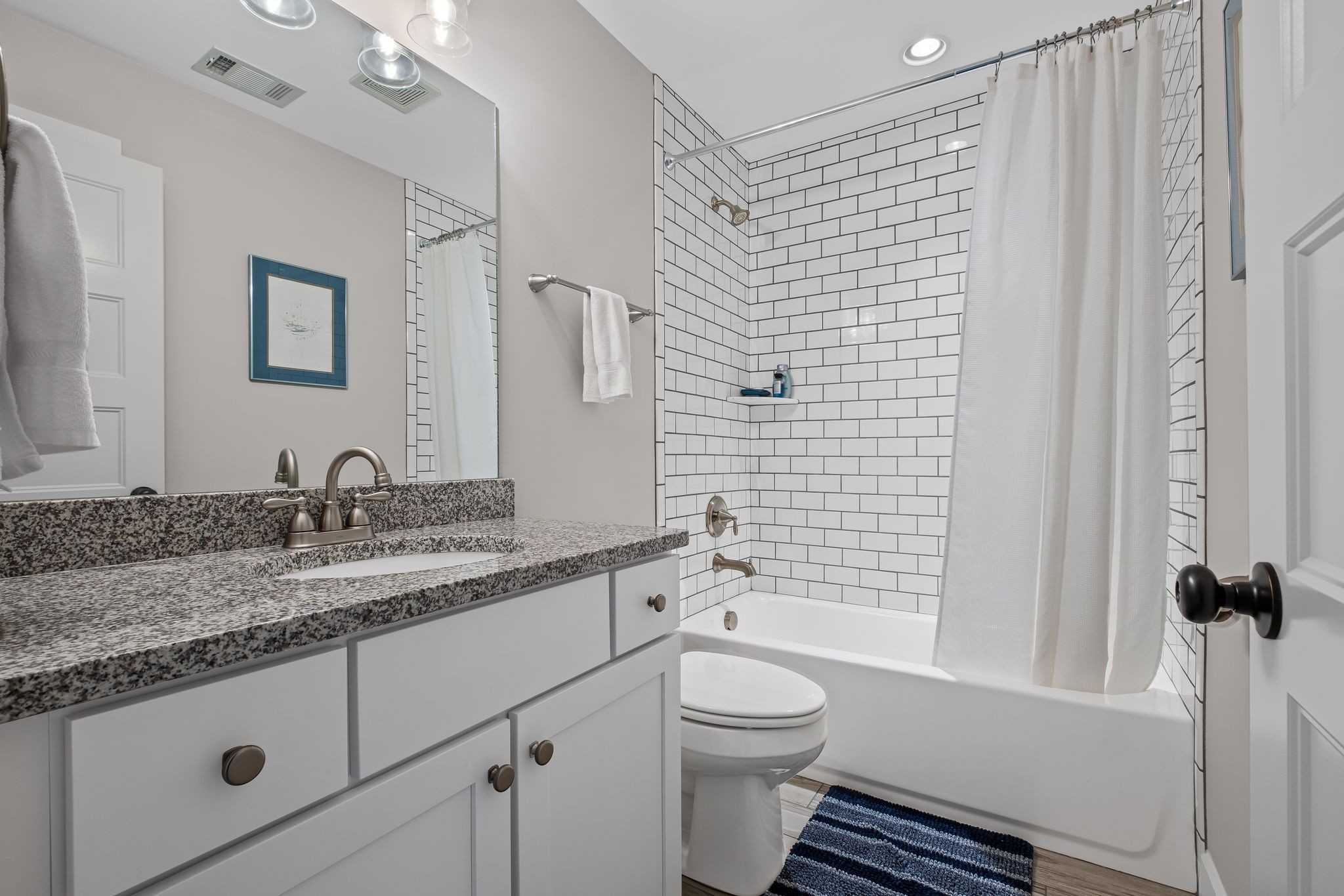 727 Philadelphia Road Lebanon, TN 37087 - Photo 34 of 67 a bathroom with a granite countertop sink toilet and shower