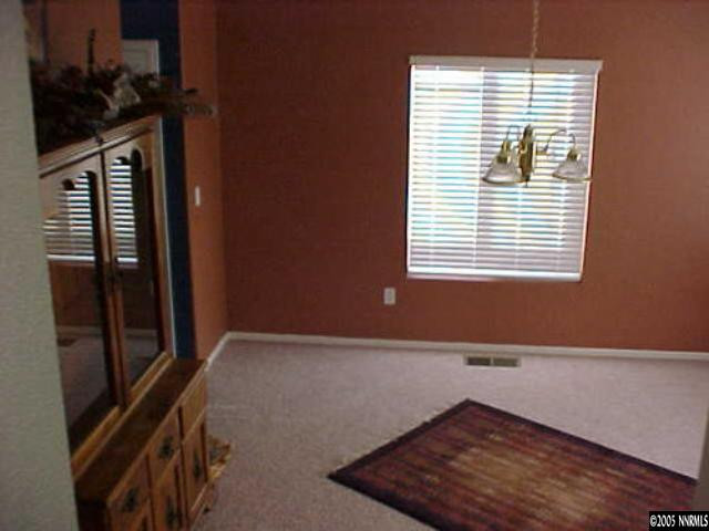 7610 Bichon Street Reno, NV 89506 - Photo 2 of 4 a view of an empty room with a window