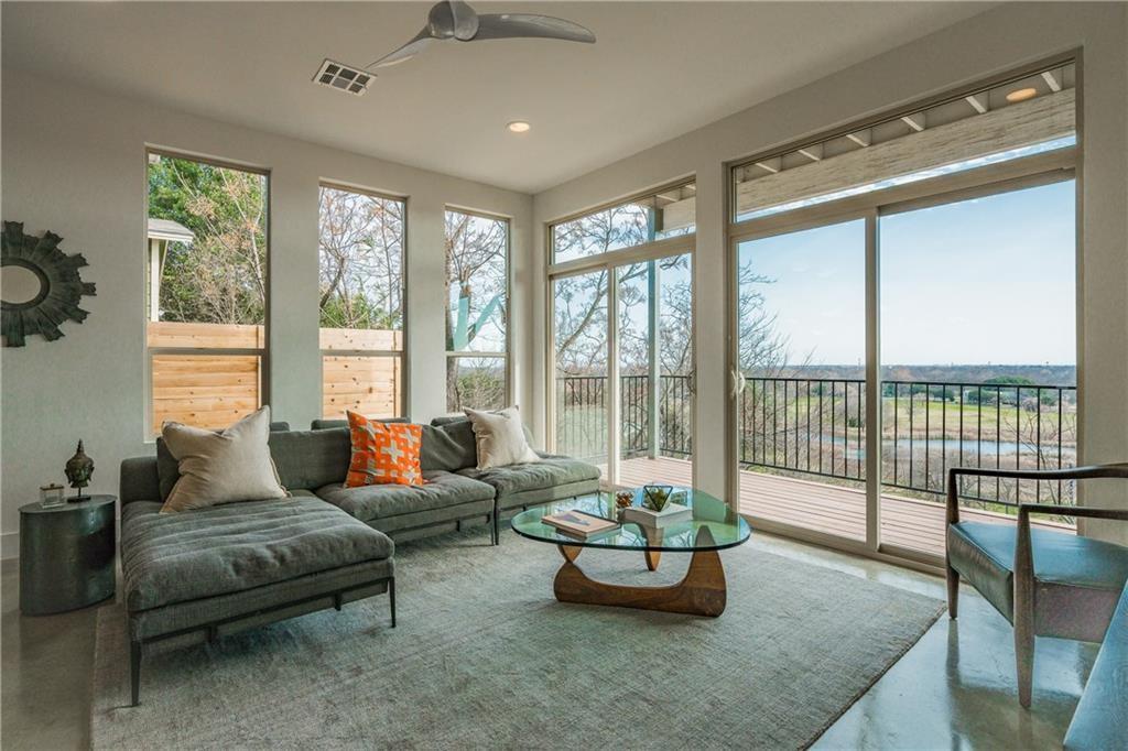 2803 Crest Avenue, Unit A Austin, TX 78702 - Photo 6 of 17 a living room with furniture and a floor to ceiling window