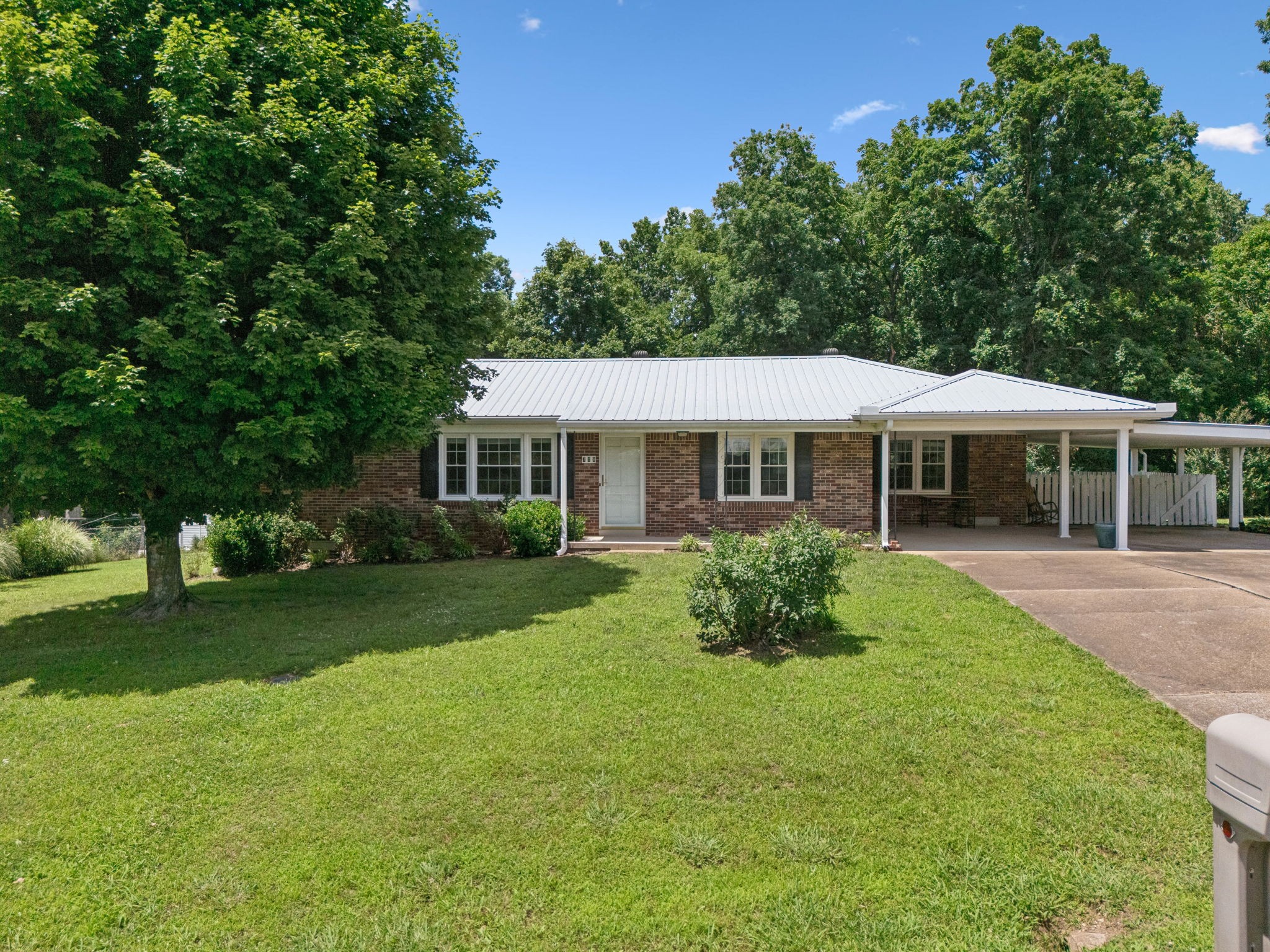 708 Hickory Street Centerville, TN 37033 - Photo 53 of 57 a front view of a house with a yard