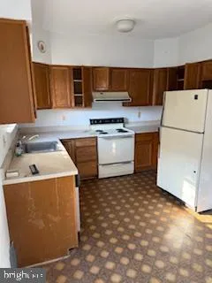 a utility room with washer and dryer