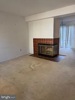 a living room with a fireplace