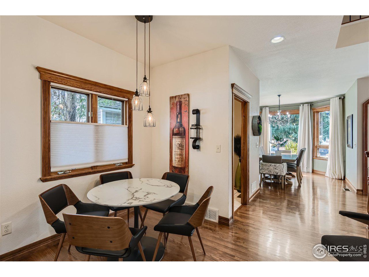 321 North Meldrum Street Fort Collins, CO 80521 - Photo 12 of 40 a dining room with furniture and window