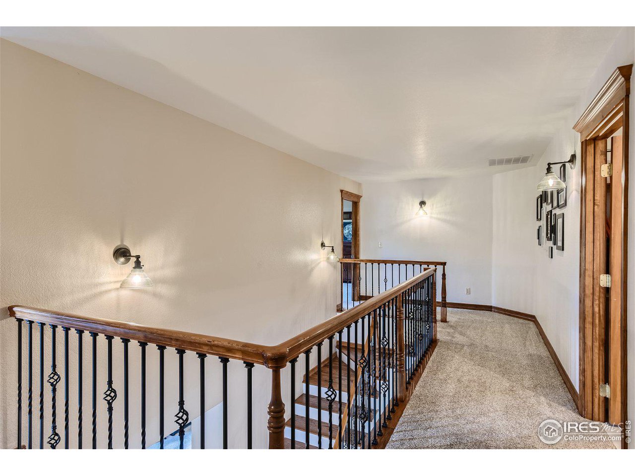 321 North Meldrum Street Fort Collins, CO 80521 - Photo 18 of 40 a view of staircase with rug