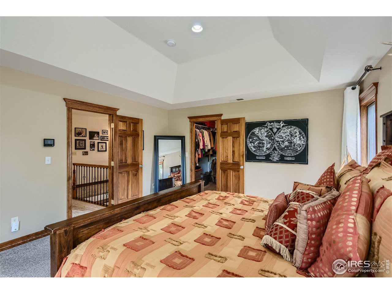 321 North Meldrum Street Fort Collins, CO 80521 - Photo 20 of 40 a bedroom with a bed and a dresser