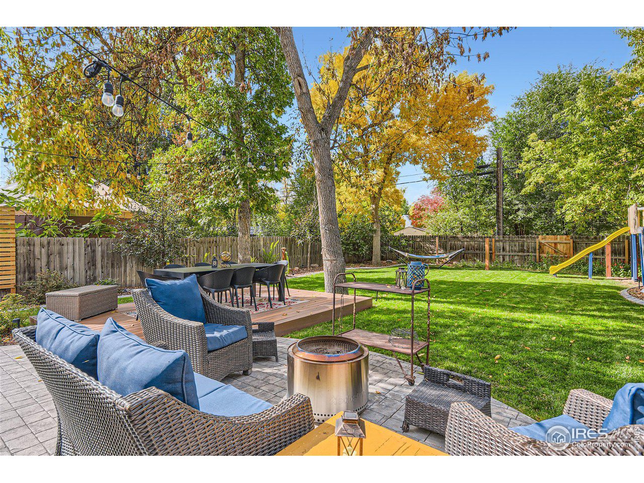 321 North Meldrum Street Fort Collins, CO 80521 - Photo 35 of 40 a view of a patio with couches chairs and a yard