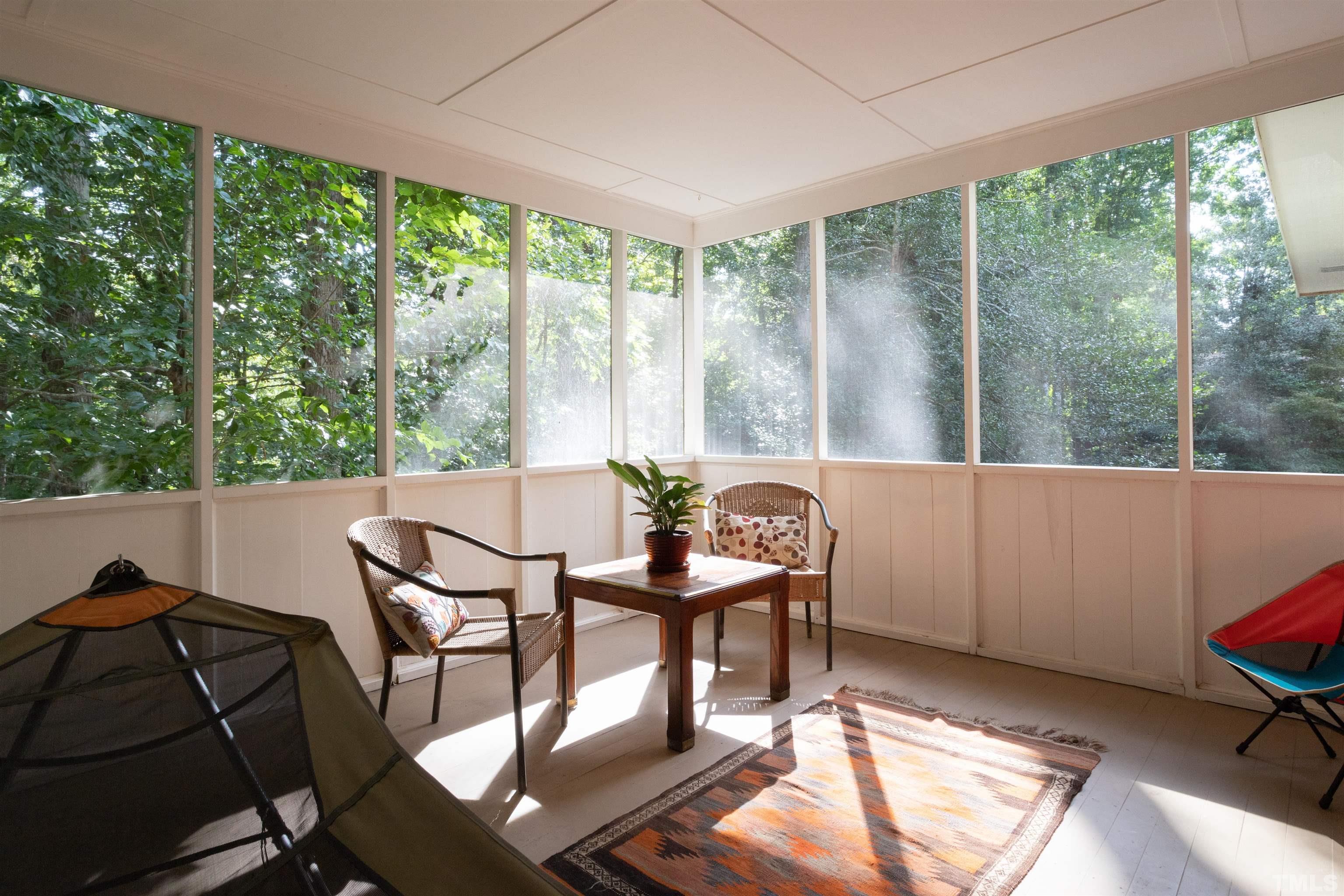 4324 Oak Park Road Raleigh, NC 27612 - Photo 18 of 33 a view of a dining room with furniture window and outside view
