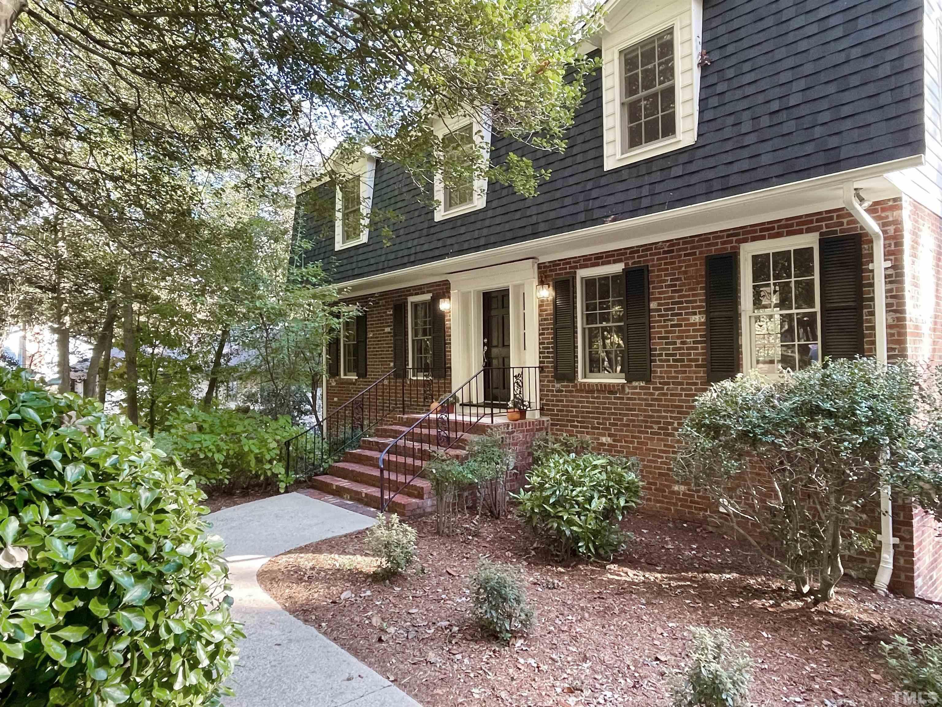 4324 Oak Park Road Raleigh, NC 27612 - Photo 2 of 33 front view of a house with a yard