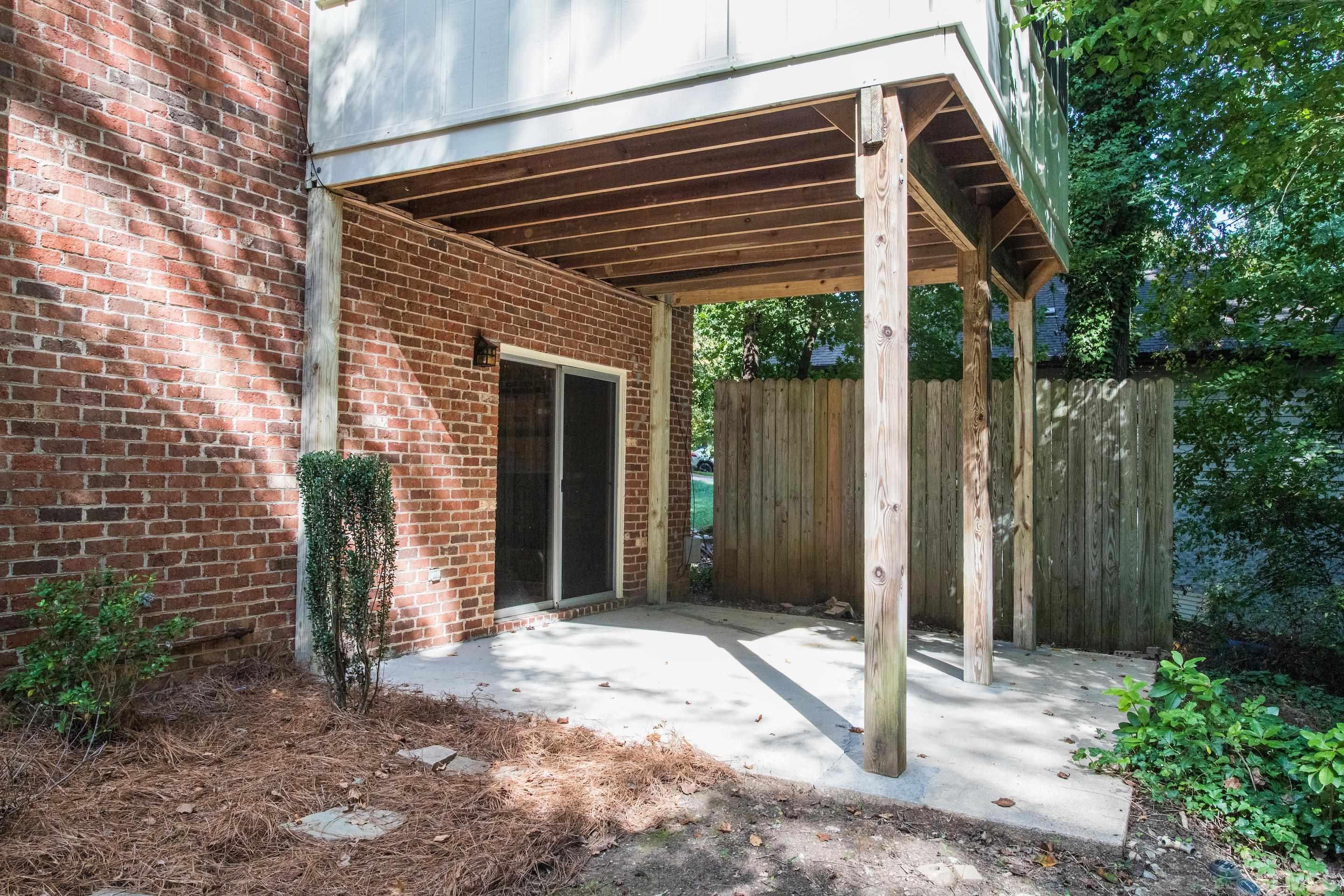 4324 Oak Park Road Raleigh, NC 27612 - Photo 30 of 33 a front view of a house with a porch