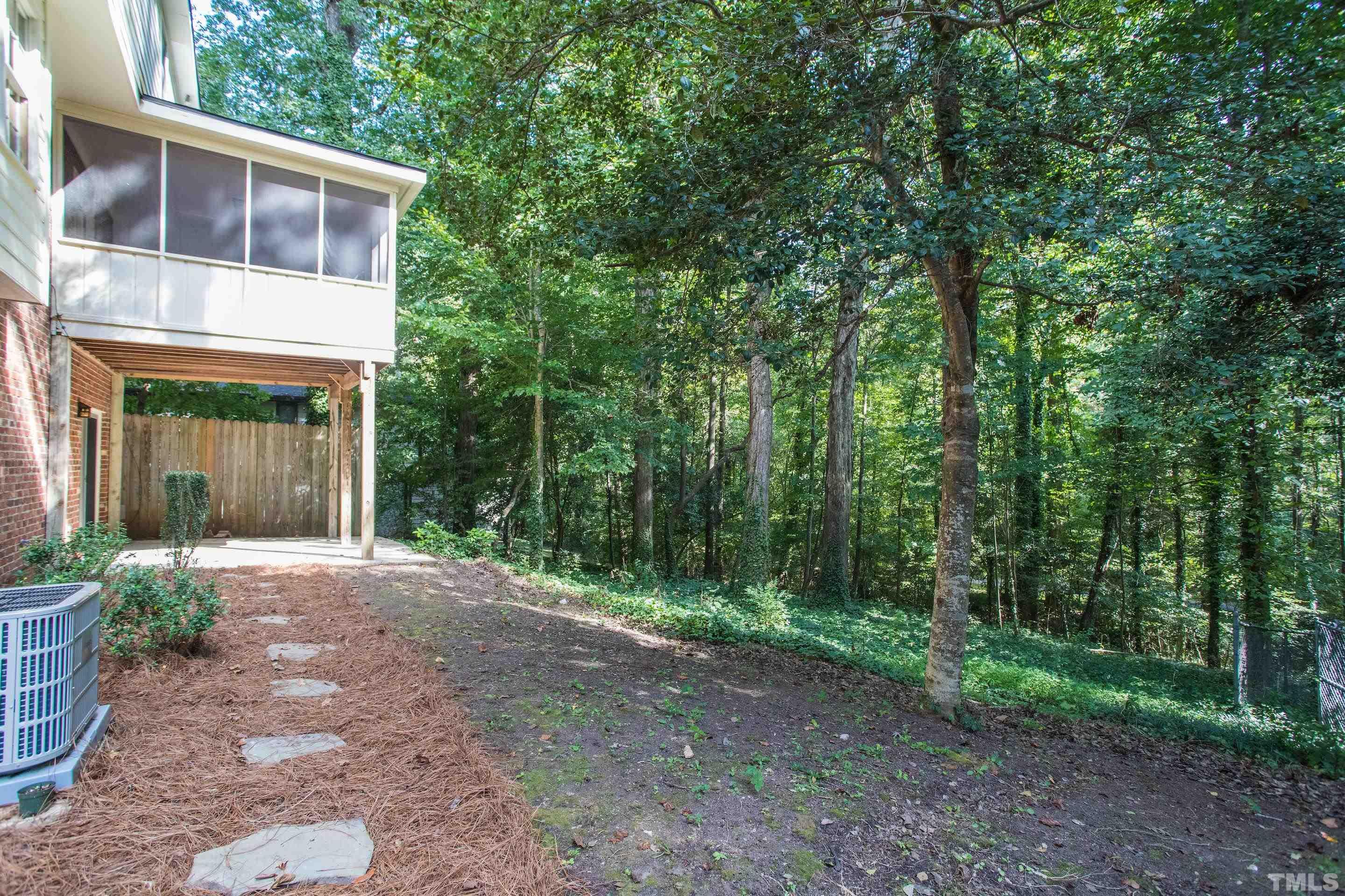 4324 Oak Park Road Raleigh, NC 27612 - Photo 31 of 33 a view of a house with a yard