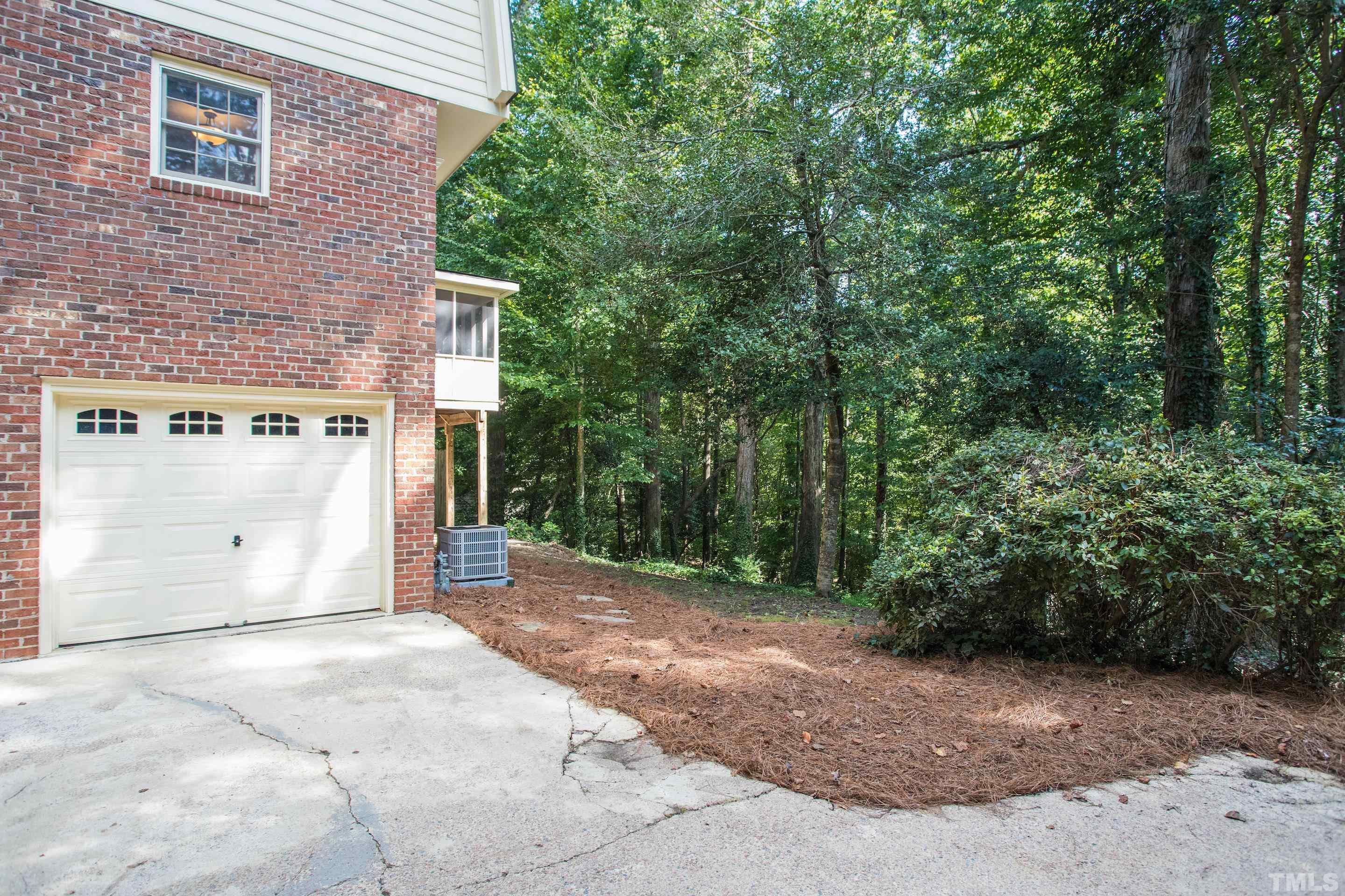 4324 Oak Park Road Raleigh, NC 27612 - Photo 33 of 33 a view of a house with a backyard