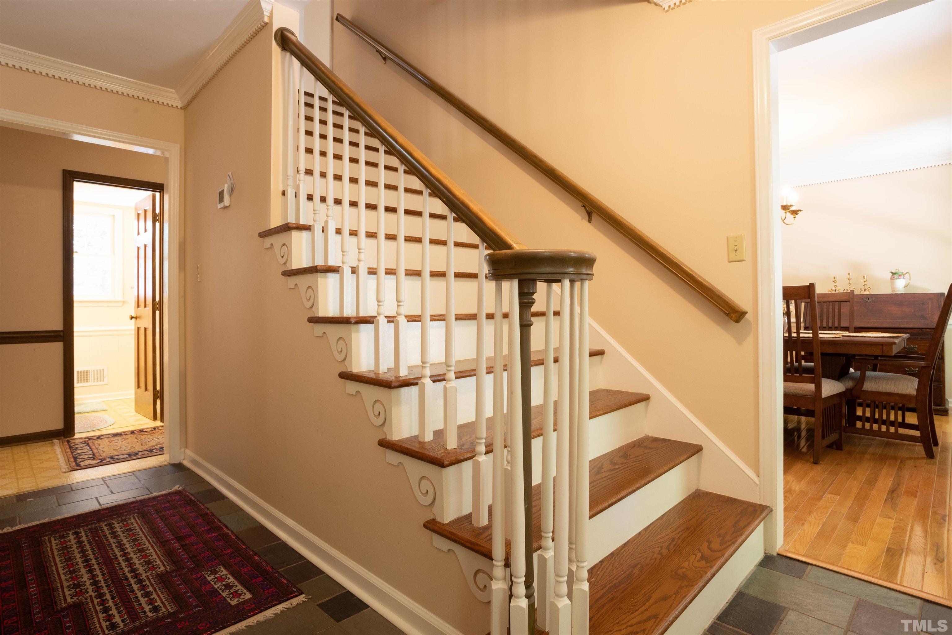 4324 Oak Park Road Raleigh, NC 27612 - Photo 4 of 33 a view of entryway with wooden floor and stairs
