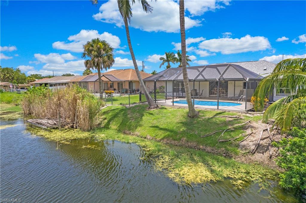 4736 25th Avenue Southwest Naples, FL 34116 - Photo 21 of 22 a view of a house with a yard