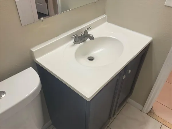 a bathroom with a sink and a toilet