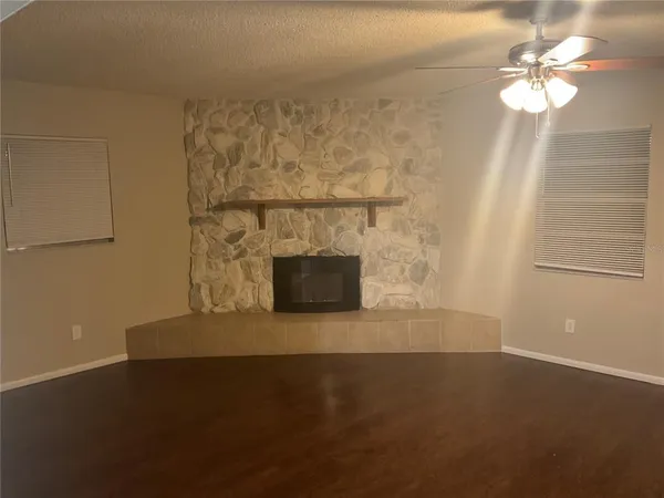 a living room with a fireplace