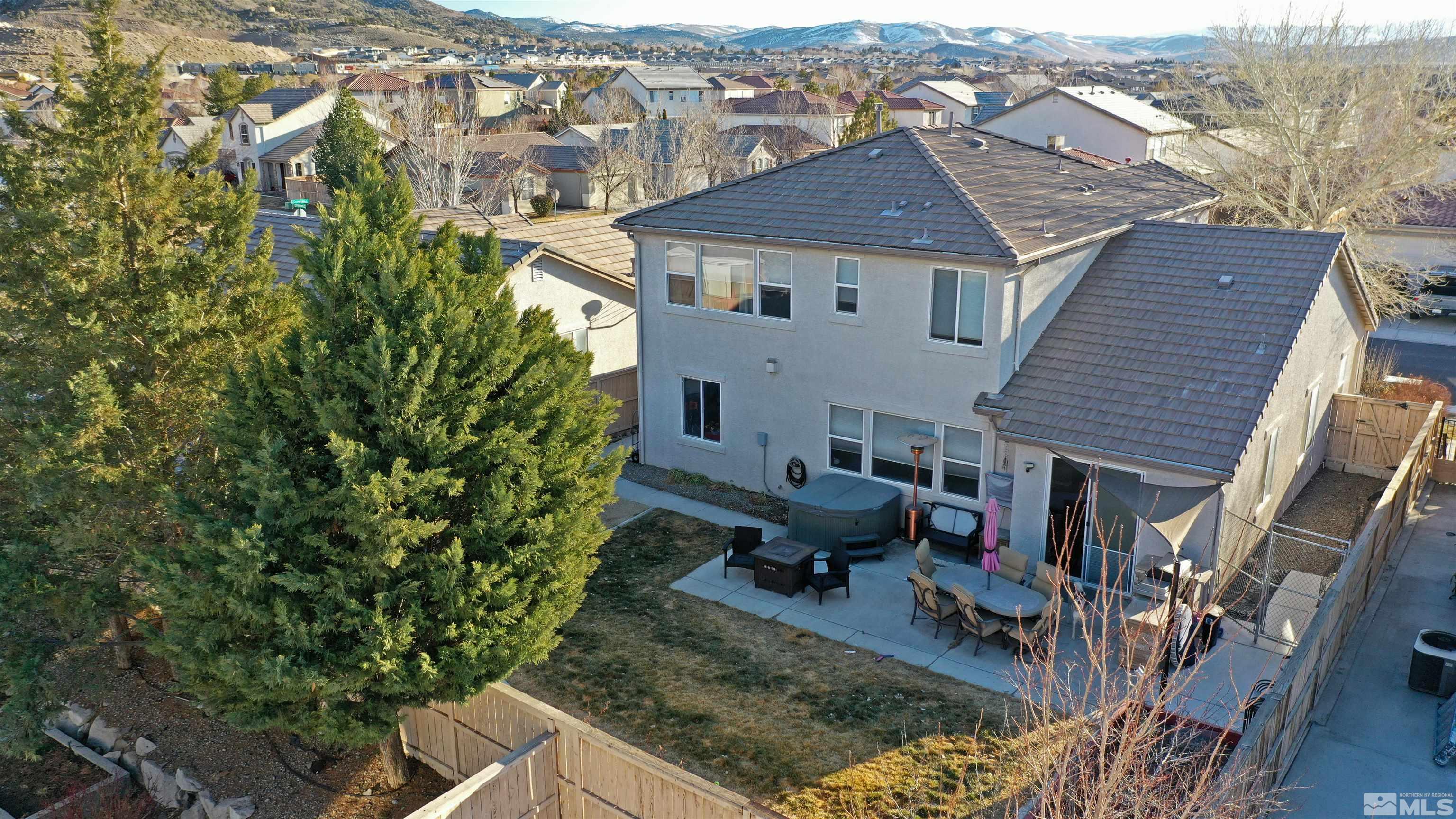 2491 Spring Flower Drive Reno, NV 89521 - Photo 19 of 19 a aerial view of a house with swimming pool and sitting area