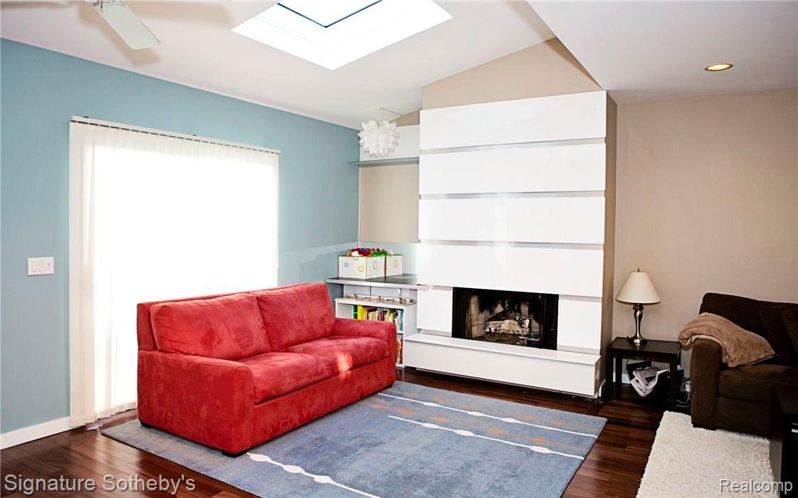 651 Ruffner Avenue Birmingham, MI 48009 - Photo 13 of 35 Skylights and gas fireplace in the living room