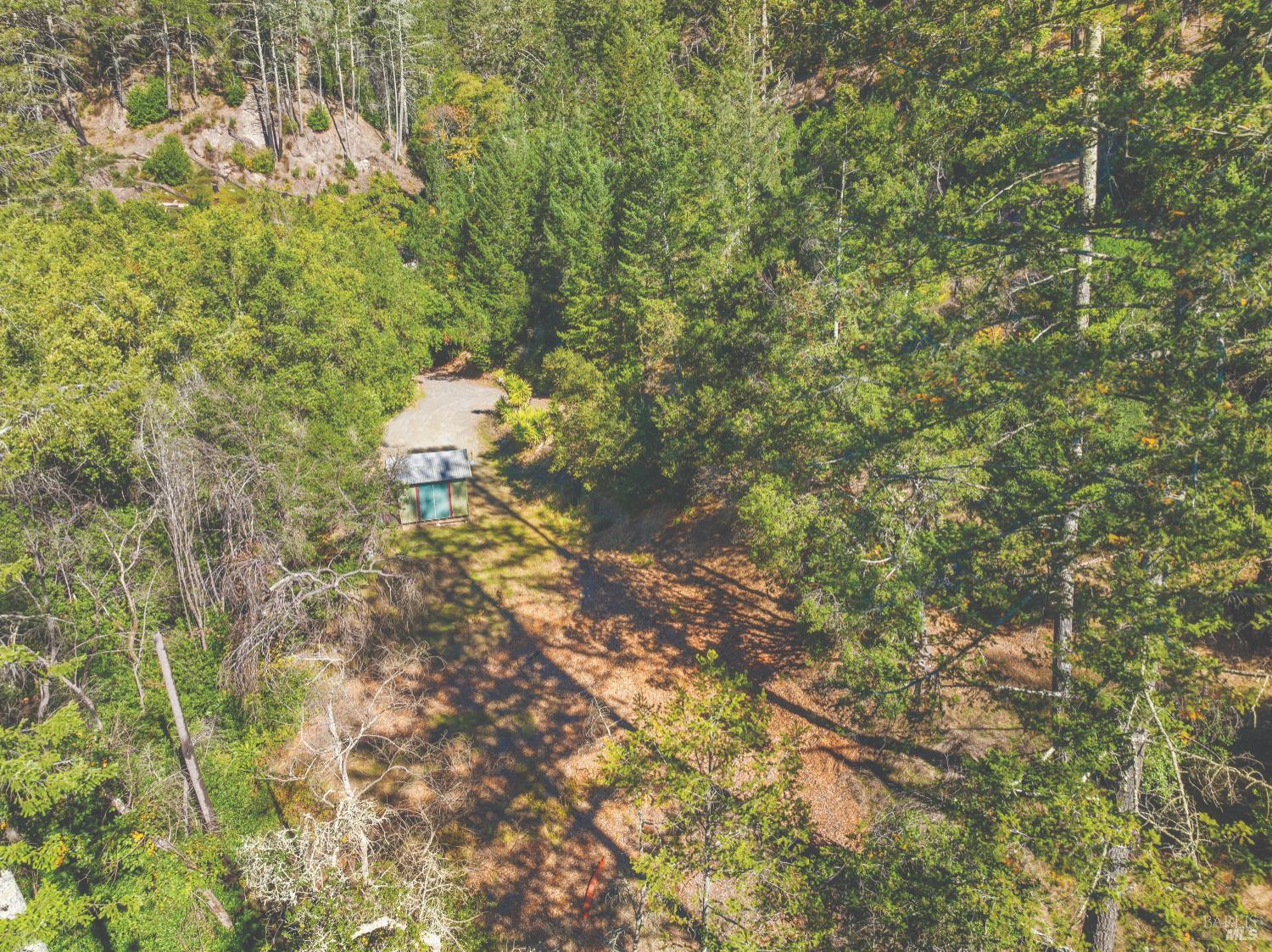 6581 St Helena Road Santa Rosa, CA 95404 - Photo 2 of 33 a backyard of a house with a yard and fountain