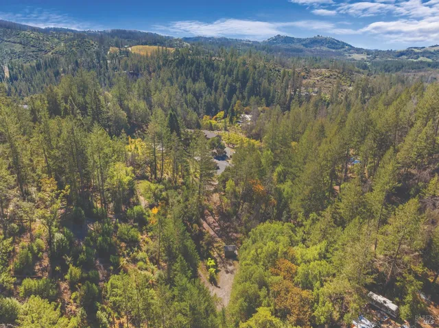 a view of a lake with mountains in the background