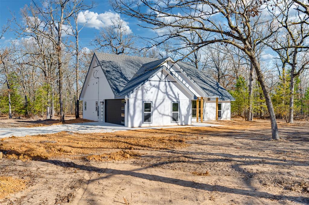 a house with trees in the background