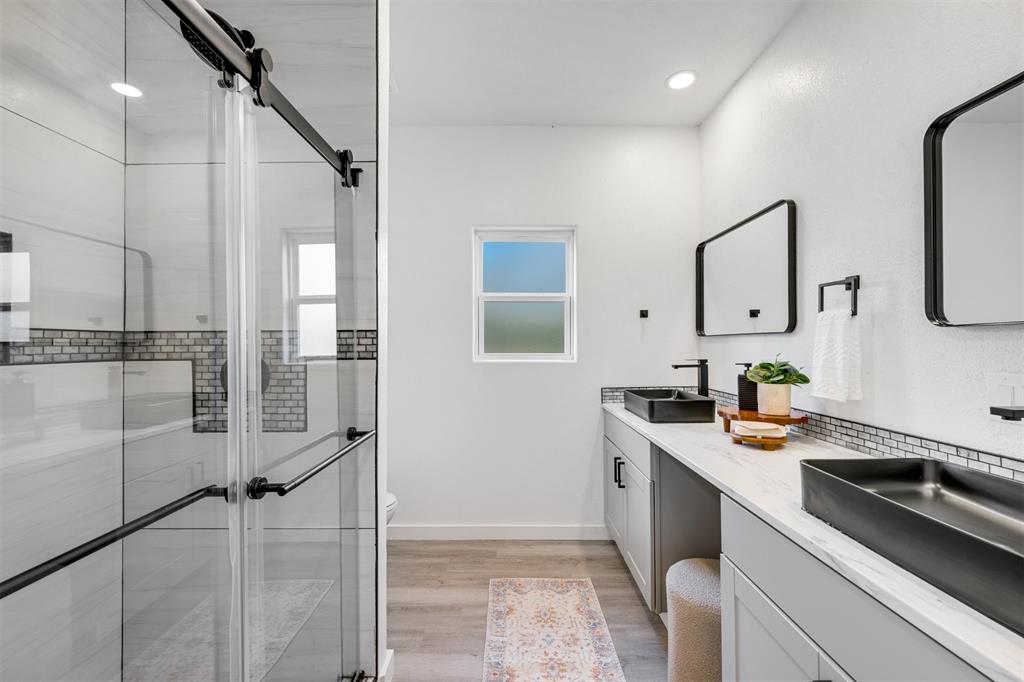 260 Private Road Sumner, TX 75486 - Photo 13 of 23 a kitchen that has a sink a stove and cabinets