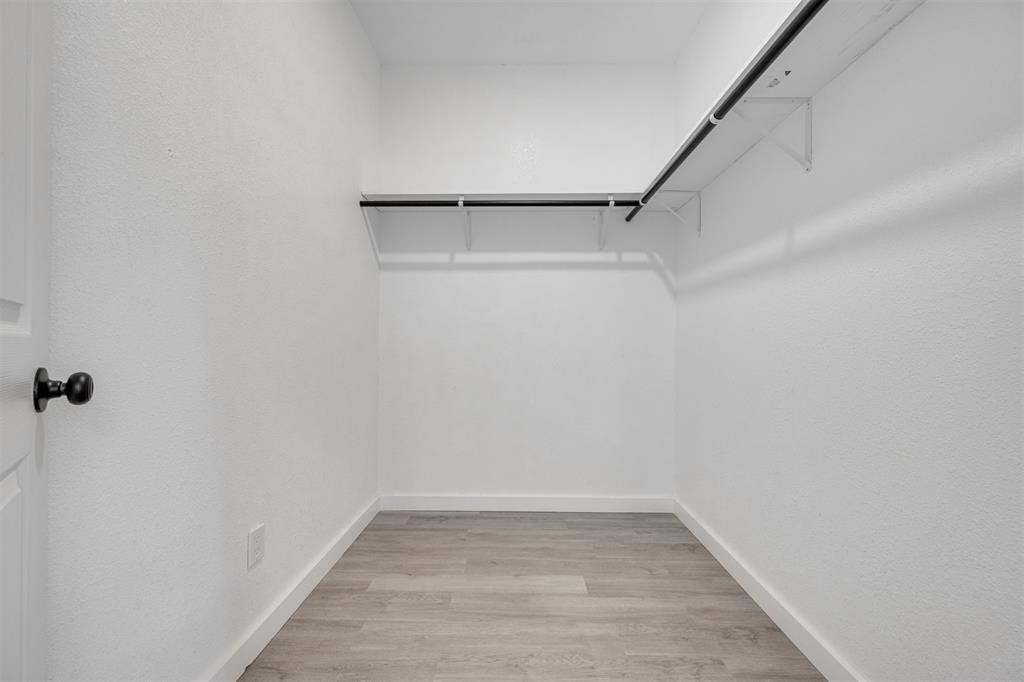 260 Private Road Sumner, TX 75486 - Photo 14 of 23 a view of a room with racks on the wall