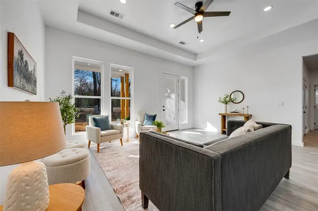 a living room with furniture and window