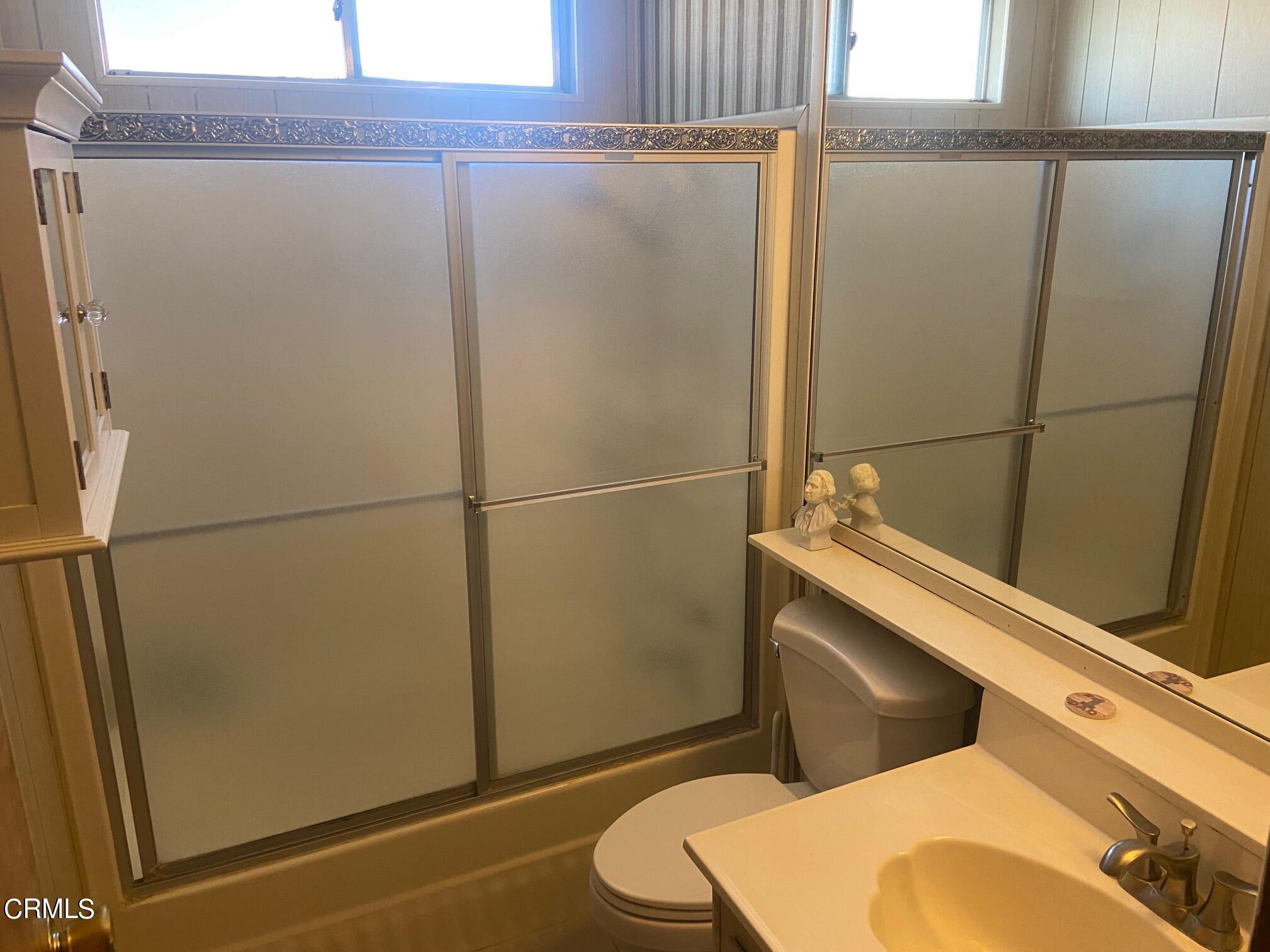 250 East Telegraph Road, Unit 76 Fillmore, CA 93015 - Photo 24 of 25 a bathroom with a toilet and a shower