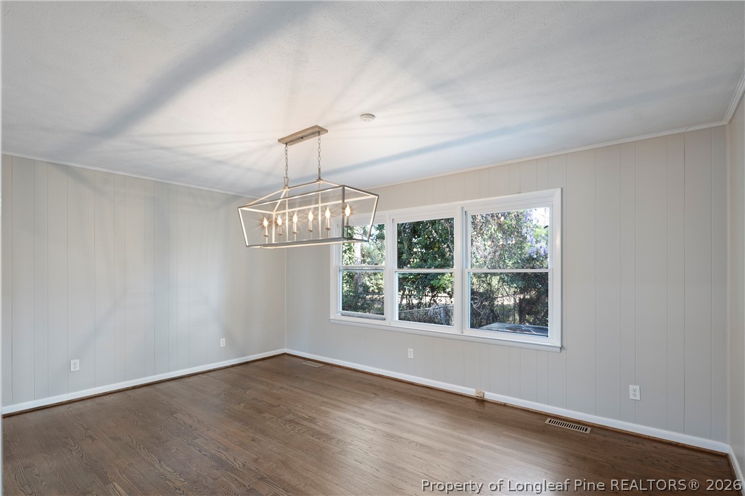 4196 Cliffdale Road Fayetteville, NC 28303 - Photo 19 of 38 a view of an empty room with a window
