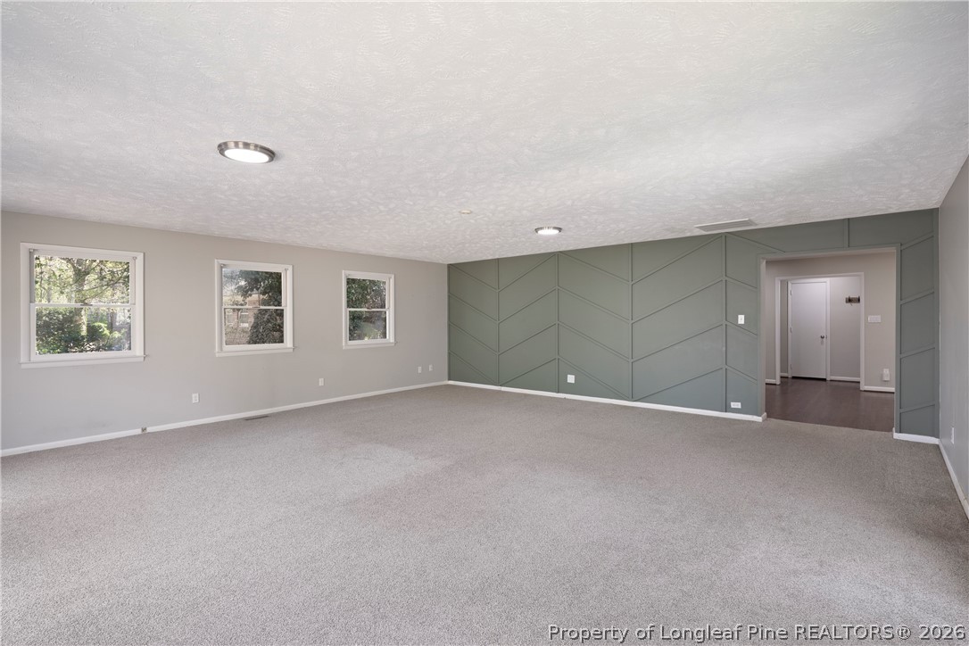 4196 Cliffdale Road Fayetteville, NC 28303 - Photo 24 of 38 a view of an empty room with a window