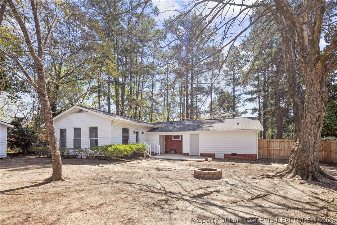 4196 Cliffdale Road Fayetteville, NC 28303 - Photo 38 of 38 a front view of a house with a yard
