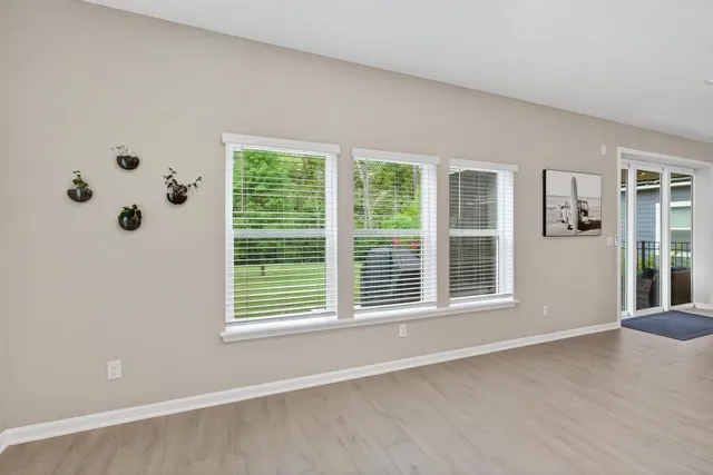 a bathroom with a shower a toilet and a shower