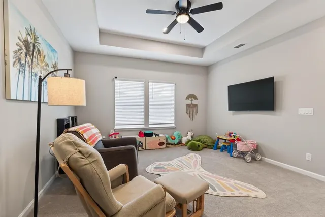 a view of a street with a trees in the background
