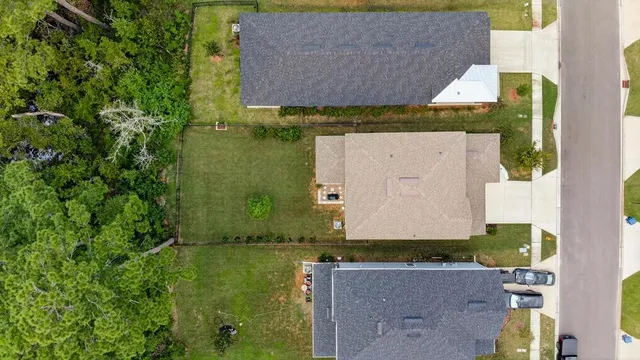 a dining room with furniture window and outside view