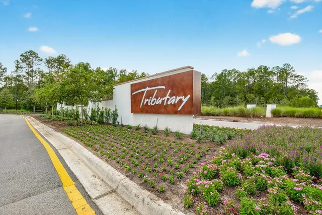 a view of a deck with couches and wooden floor