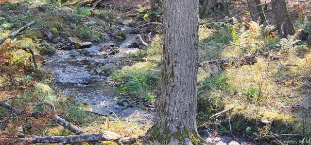 a view of a hallway with stairs