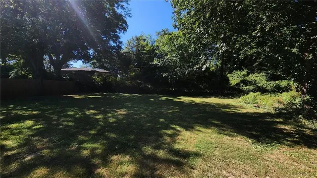 a view of outdoor space and yard