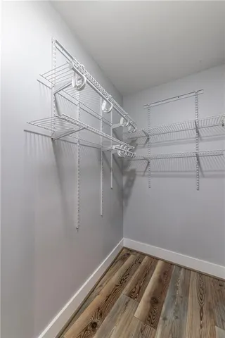 a view of a room with racks on the wall