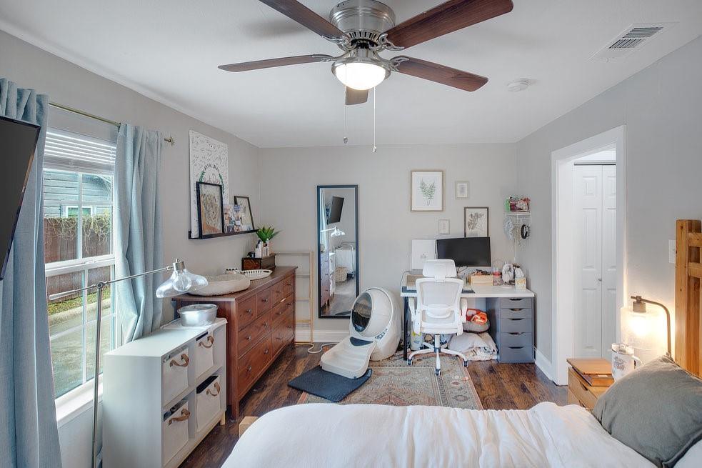 4029 Knox Street Fort Worth, TX 76119 - Photo 11 of 28 a living room with furniture and a wooden floor