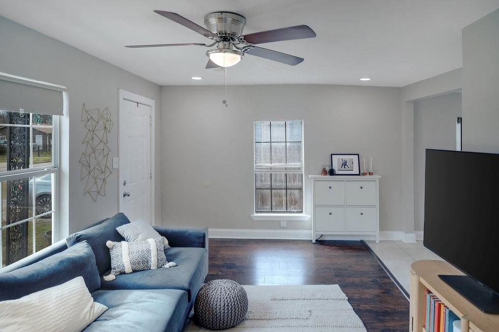 4029 Knox Street Fort Worth, TX 76119 - Photo 16 of 28 a living room with furniture and a flat screen tv