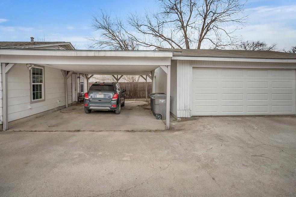 4029 Knox Street Fort Worth, TX 76119 - Photo 21 of 28 a car parked in front of a building