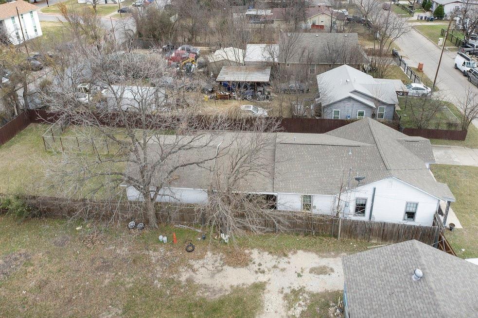 4029 Knox Street Fort Worth, TX 76119 - Photo 25 of 28 a aerial view of a house with a yard