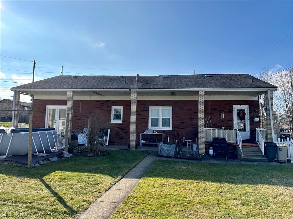 351 Rockdale Road Follansbee, WV 26037 - Photo 4 of 18 Back of property featuring a lawn