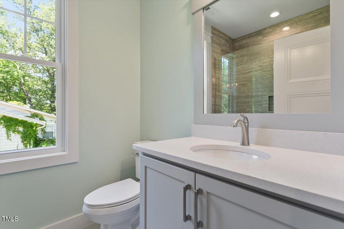 3934 Old Chapel Hill Road Durham, NC 27707 - Photo 37 of 47 a bathroom with a sink and a toilet