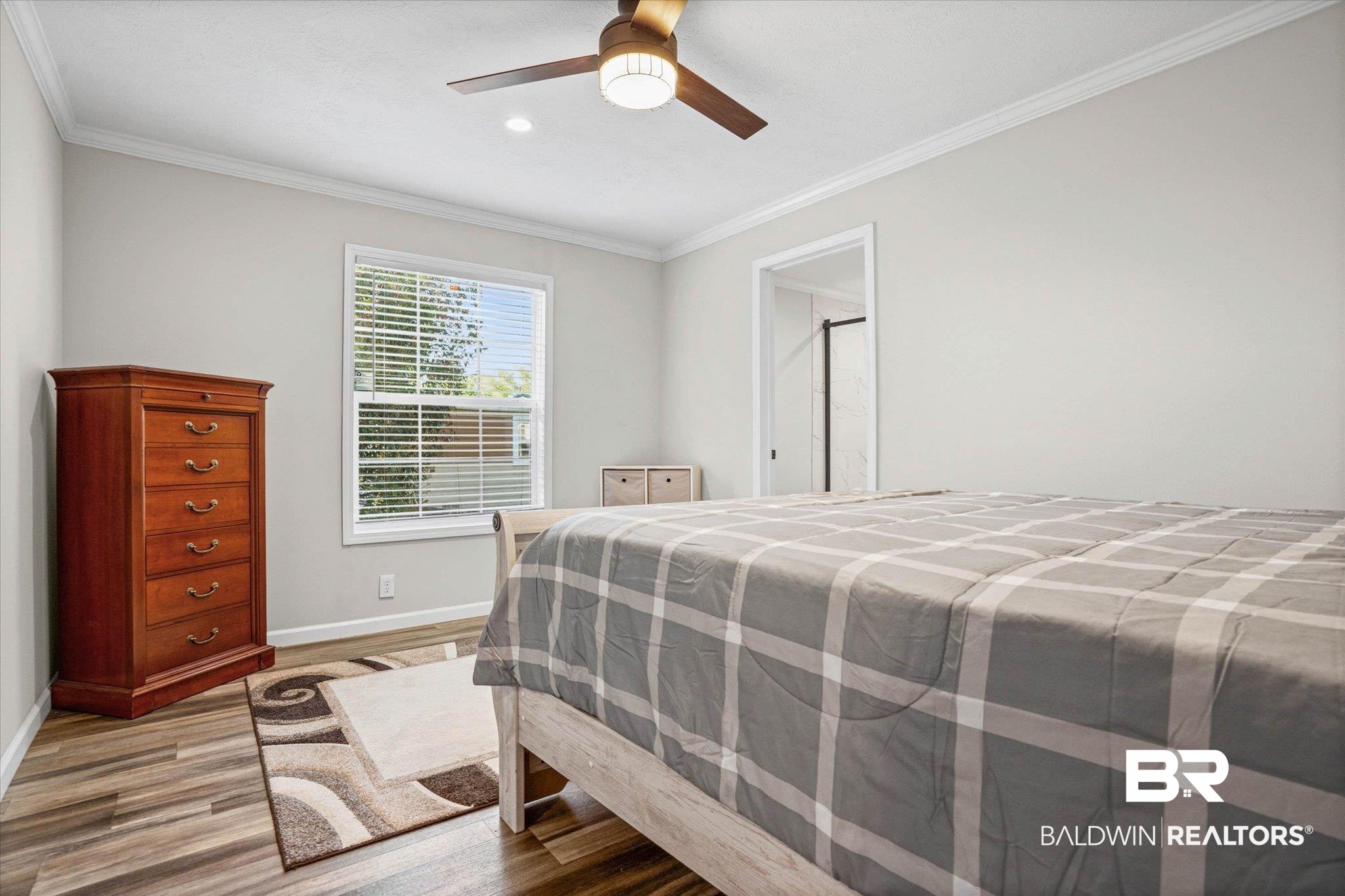 1325 Ridgewood Drive Lillian, AL 36549 - Photo 8 of 32 Bedroom with crown molding, light wood finished floors, ceiling fan, and recessed lighting