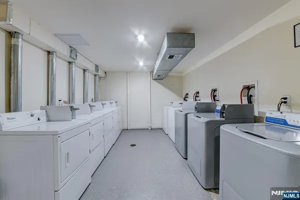 a view of bathroom with dual sinks
