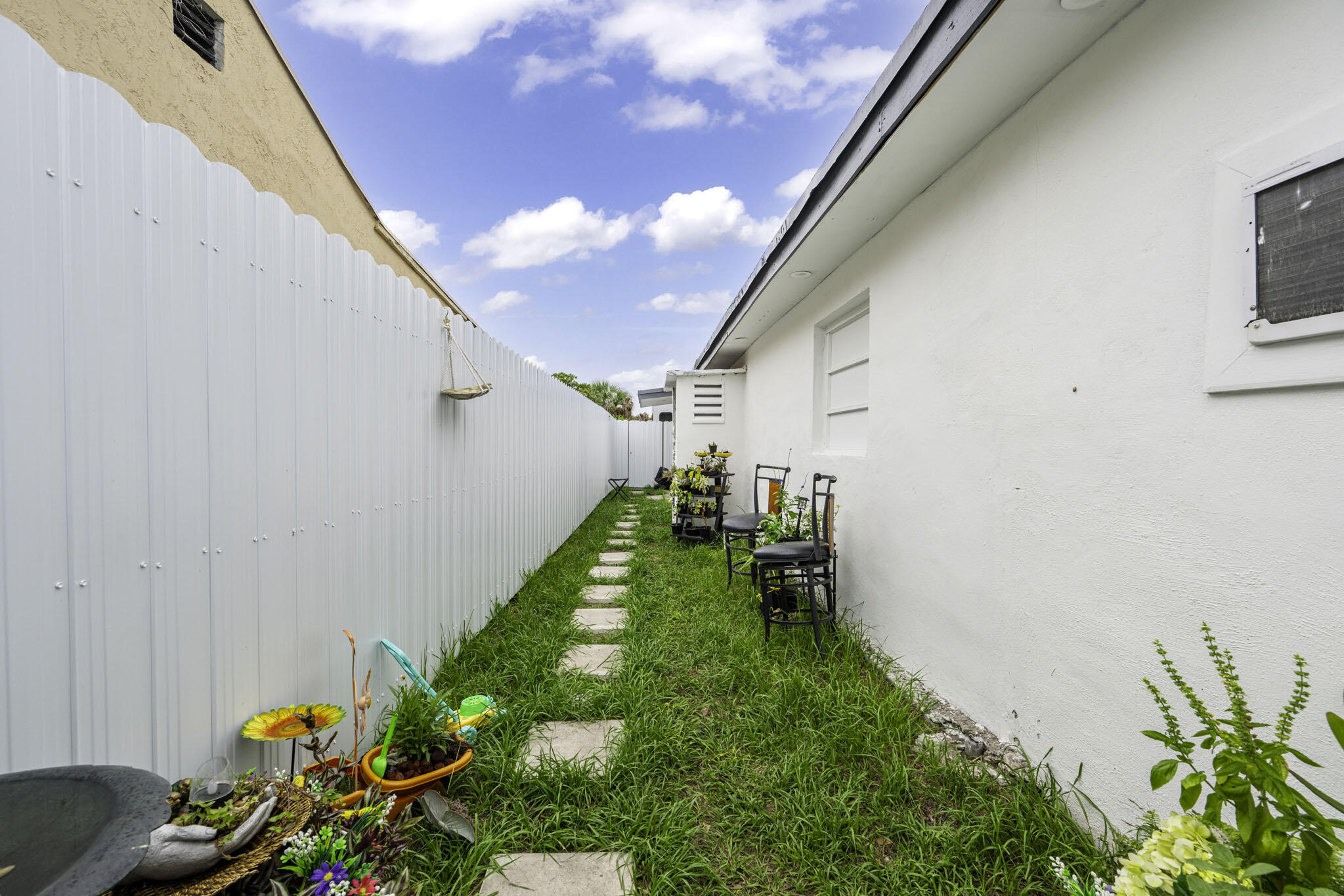2365 Northwest 68th Street Miami, FL 33147 - Photo 17 of 22 a view of a backyard with plants