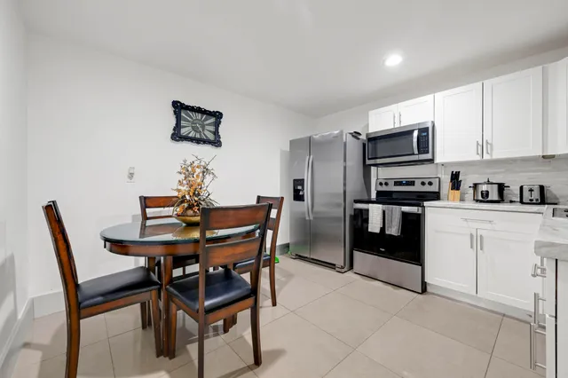 a view of a dining room with furniture
