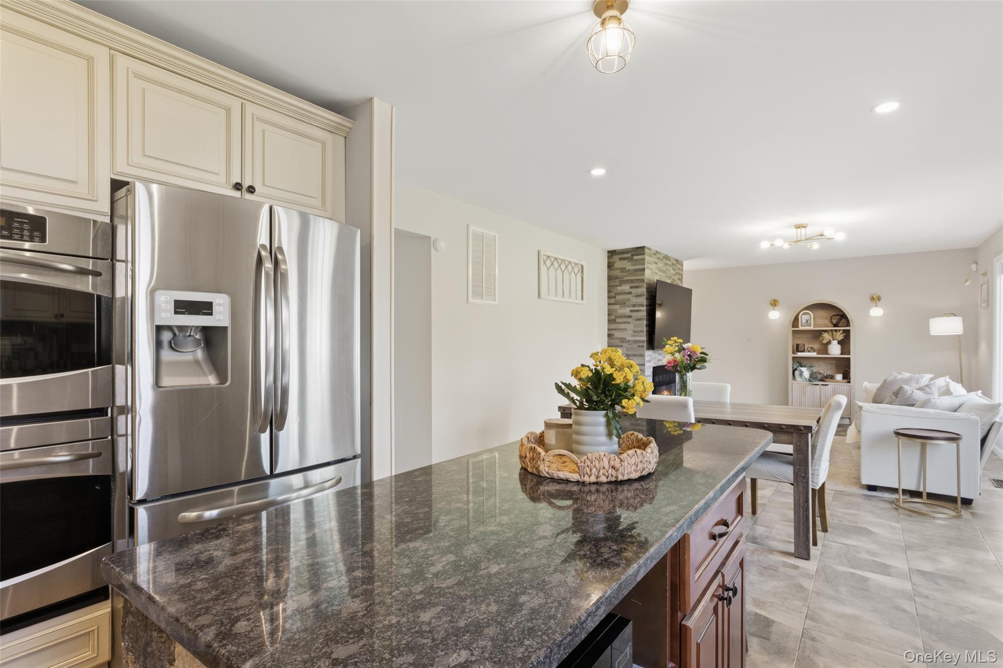 130 Cobb Road Brewster, NY 10509 - Photo 14 of 48 The heart of the home is the well-appointed kitchen, featuring granite countertops, stainless steel appliances, a double wall oven, electric cooktop, and tile flooring